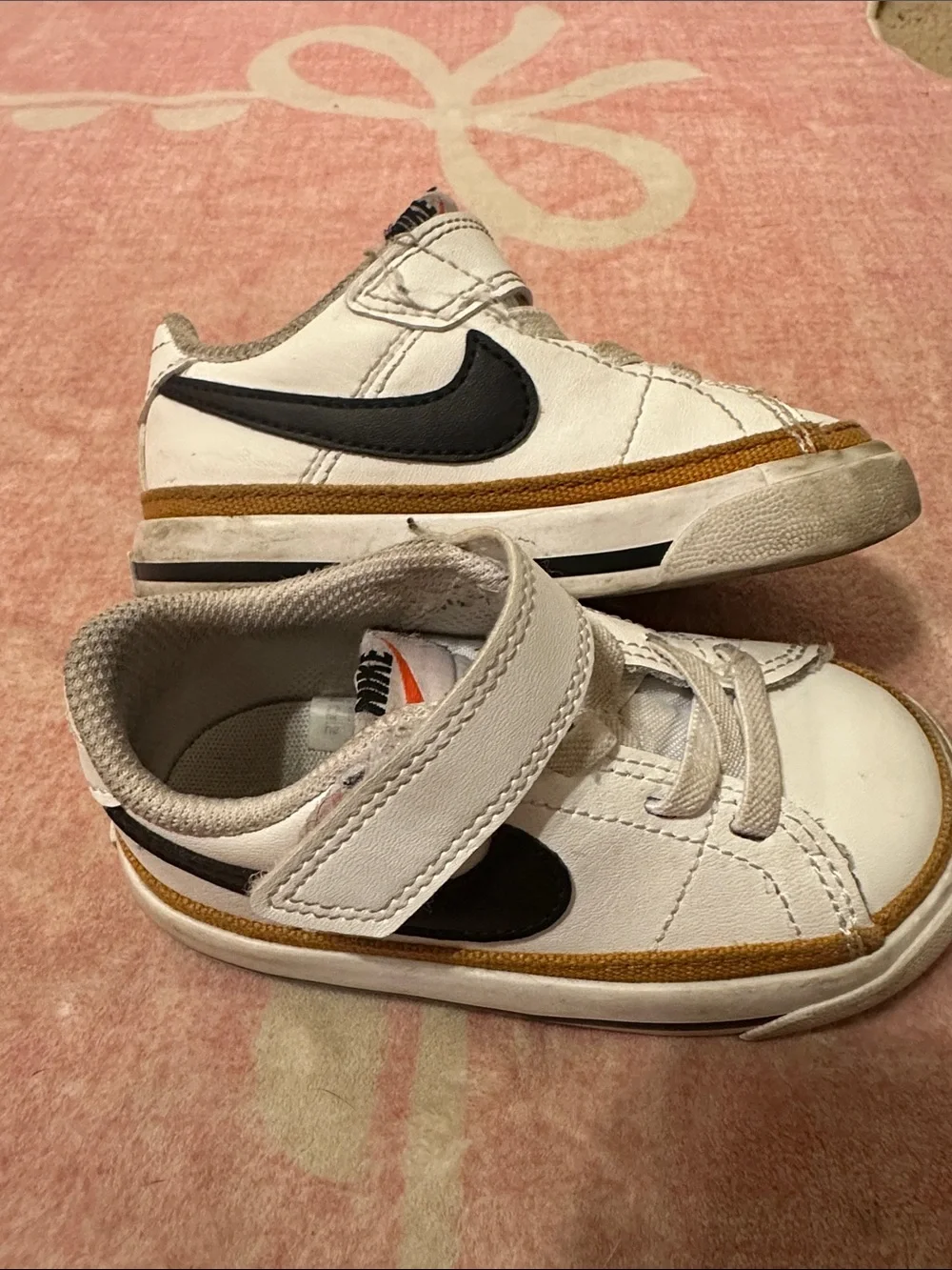 Nike Kids White Sneakers with Black Swoosh and Tan Trim